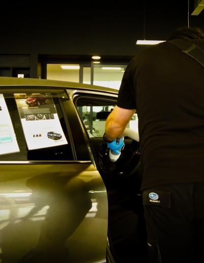 Product being fogged into right front drivers side area as a fine mist application