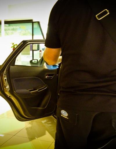 Applicator applying product to left rear door can see the mist from the fogging unit