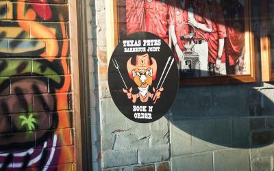 Protecting signwriting and outdoor artwork from UV damage.