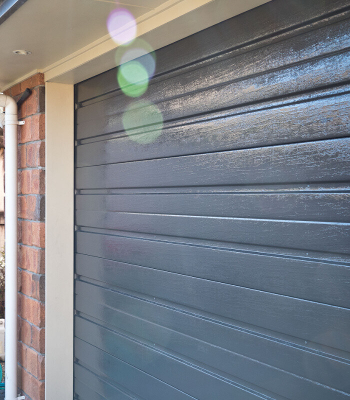 Reflections on garage door after coating applied